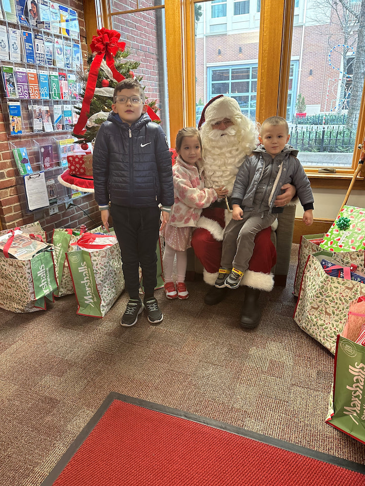 Children posing with Santa.